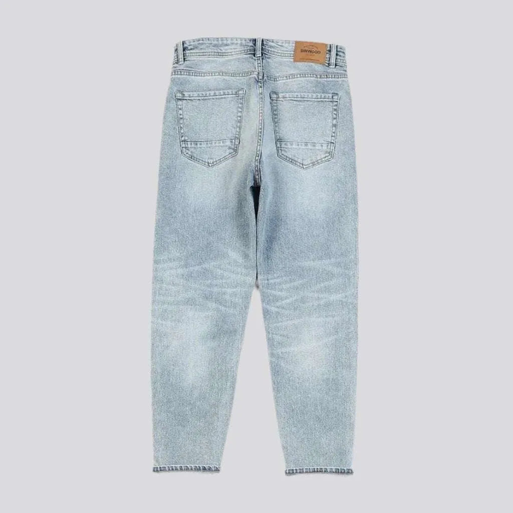 Sanded men's tapered jeans