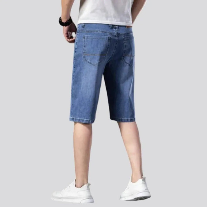 Knee-length men's denim shorts