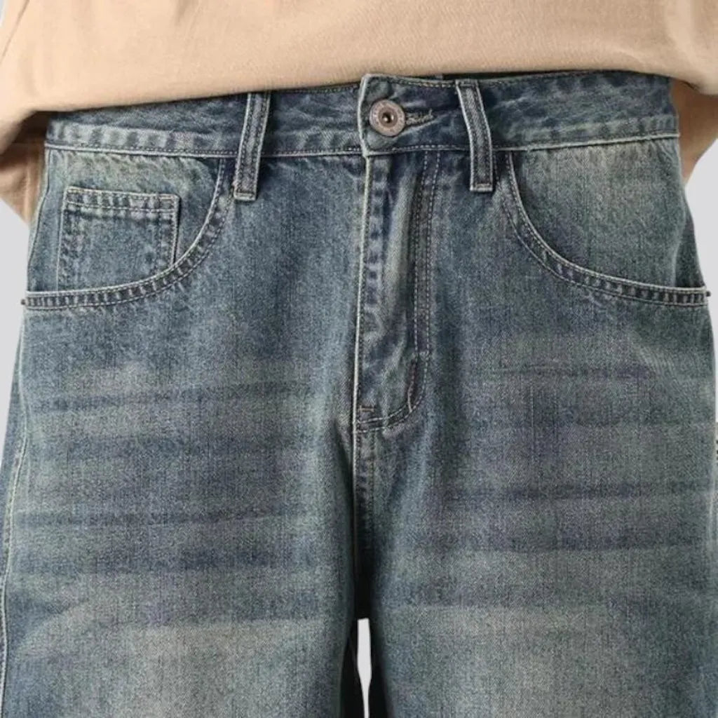 Sanded knee-length jeans shorts