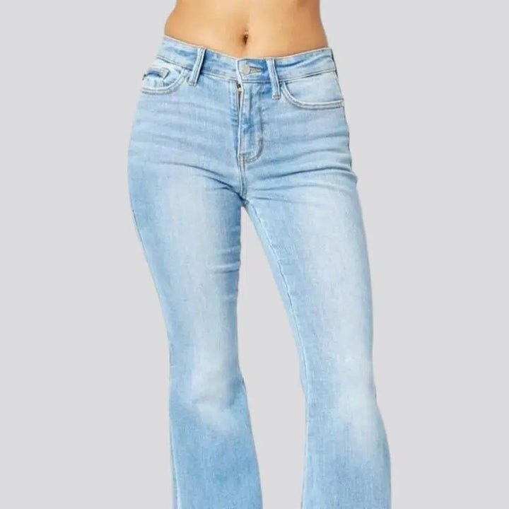 Light-wash sanded jeans
 for women