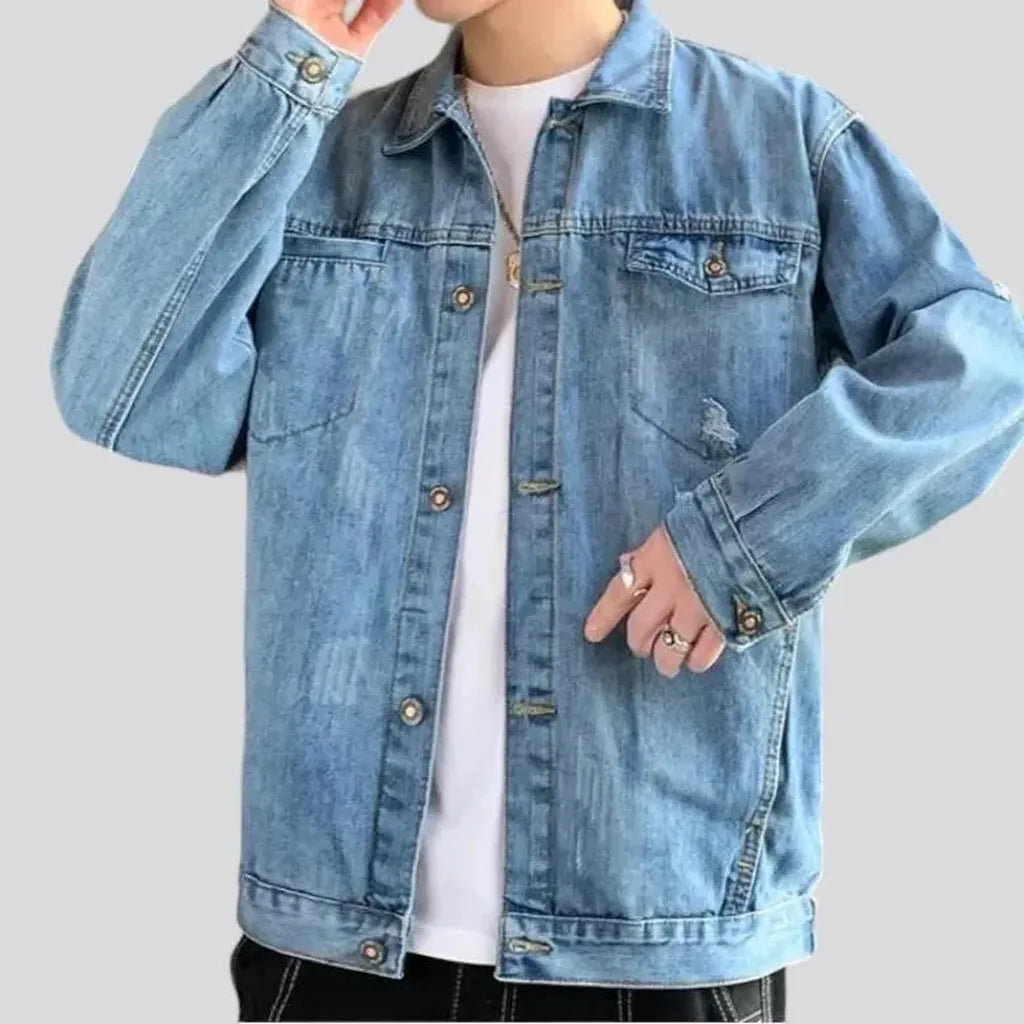 Light-wash distressed jeans jacket