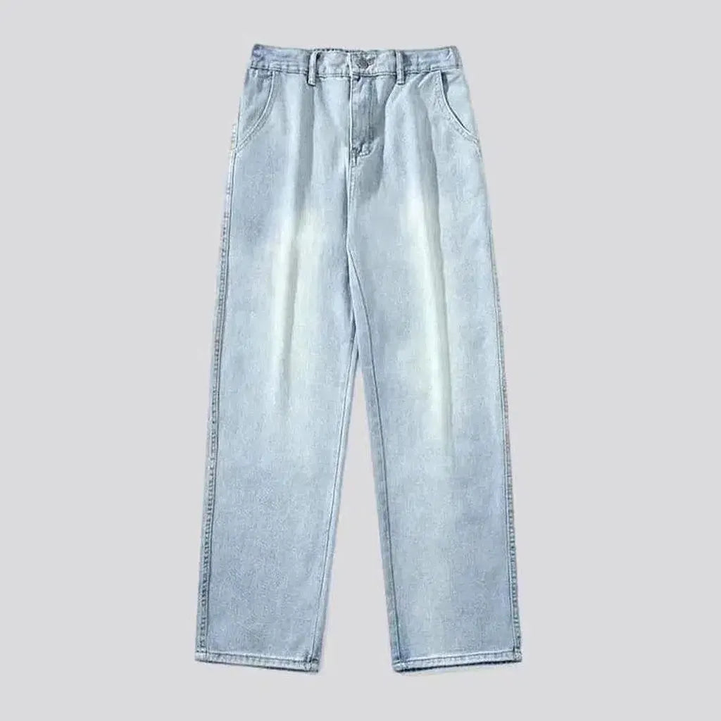 Floor-length men's stonewashed jeans