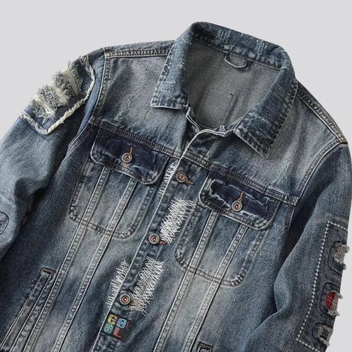 Distressed men's jean jacket