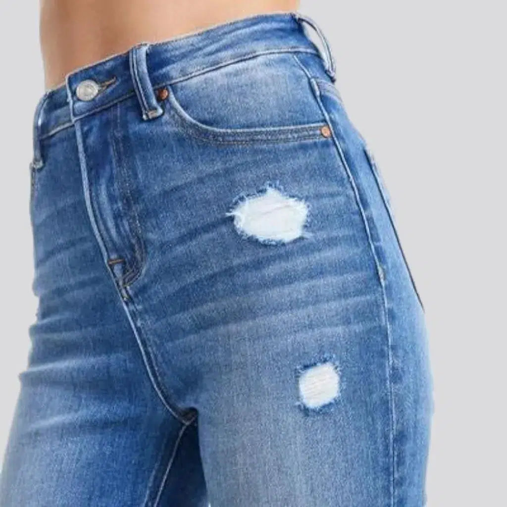 Ripped sanded jeans
 for ladies