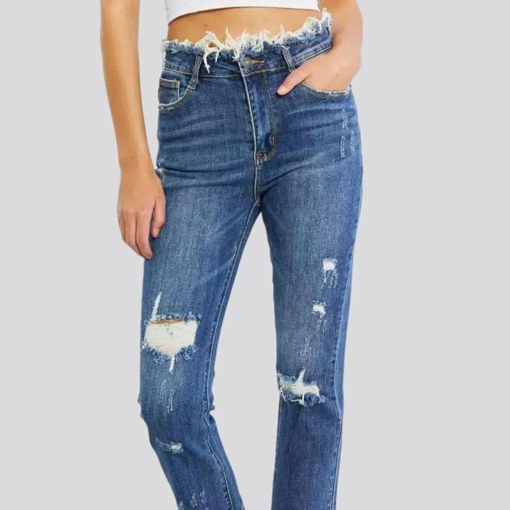 Distressed medium-wash jeans
 for women