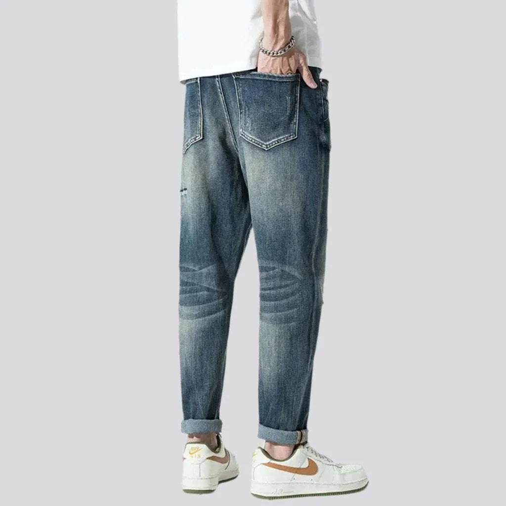 Baggy men's sanded jeans