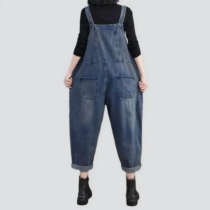Medium-wash sanded jeans jumpsuit