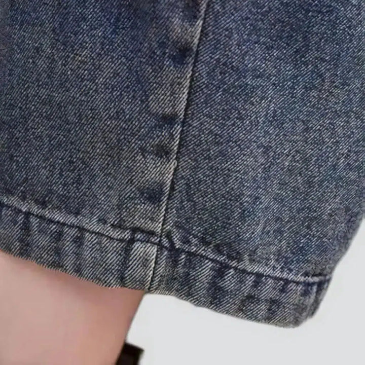 Medium-wash sanded jeans jumpsuit