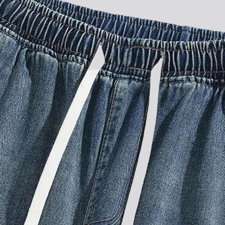Aged men's stonewashed jeans