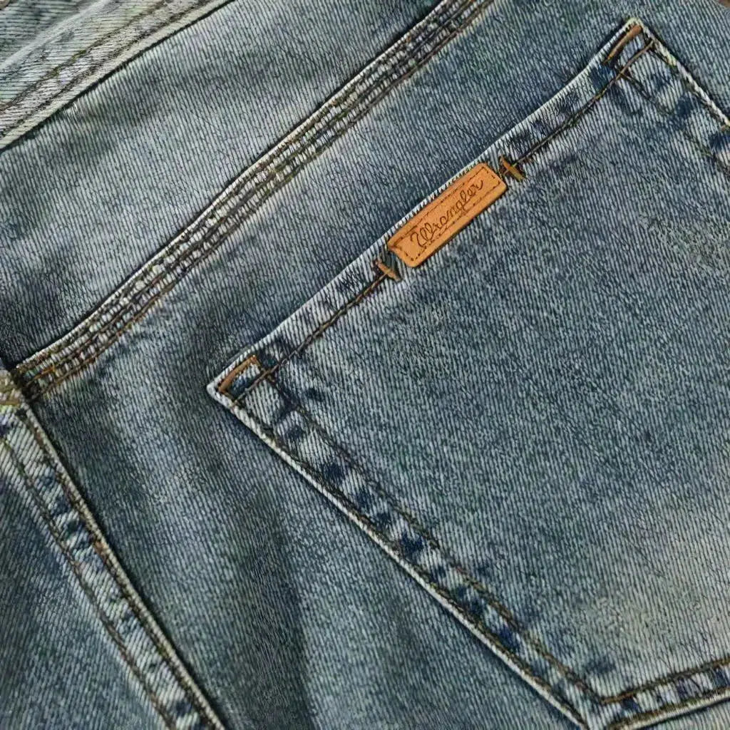 Whiskered men's light-wash jeans