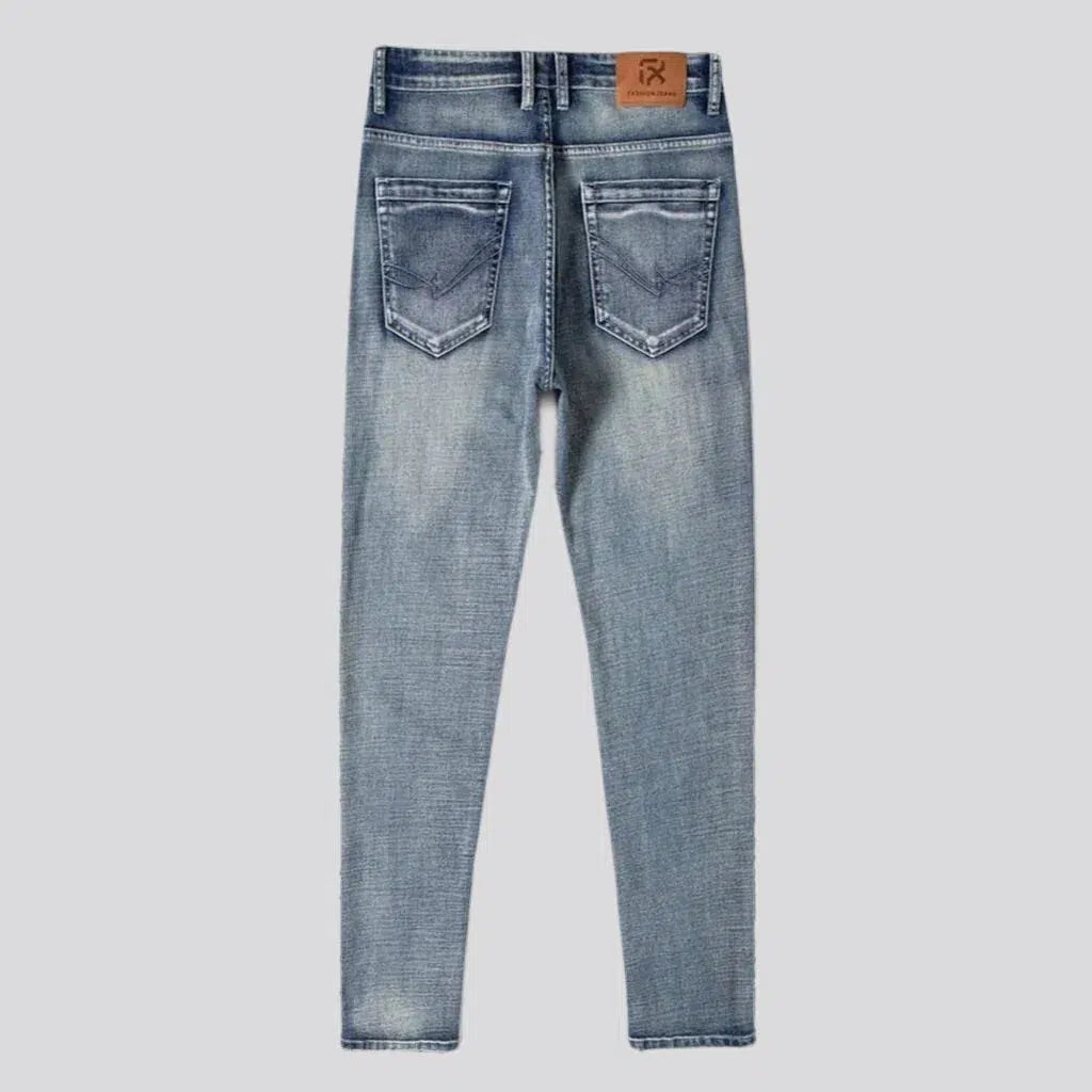 Stonewashed men's sanded jeans