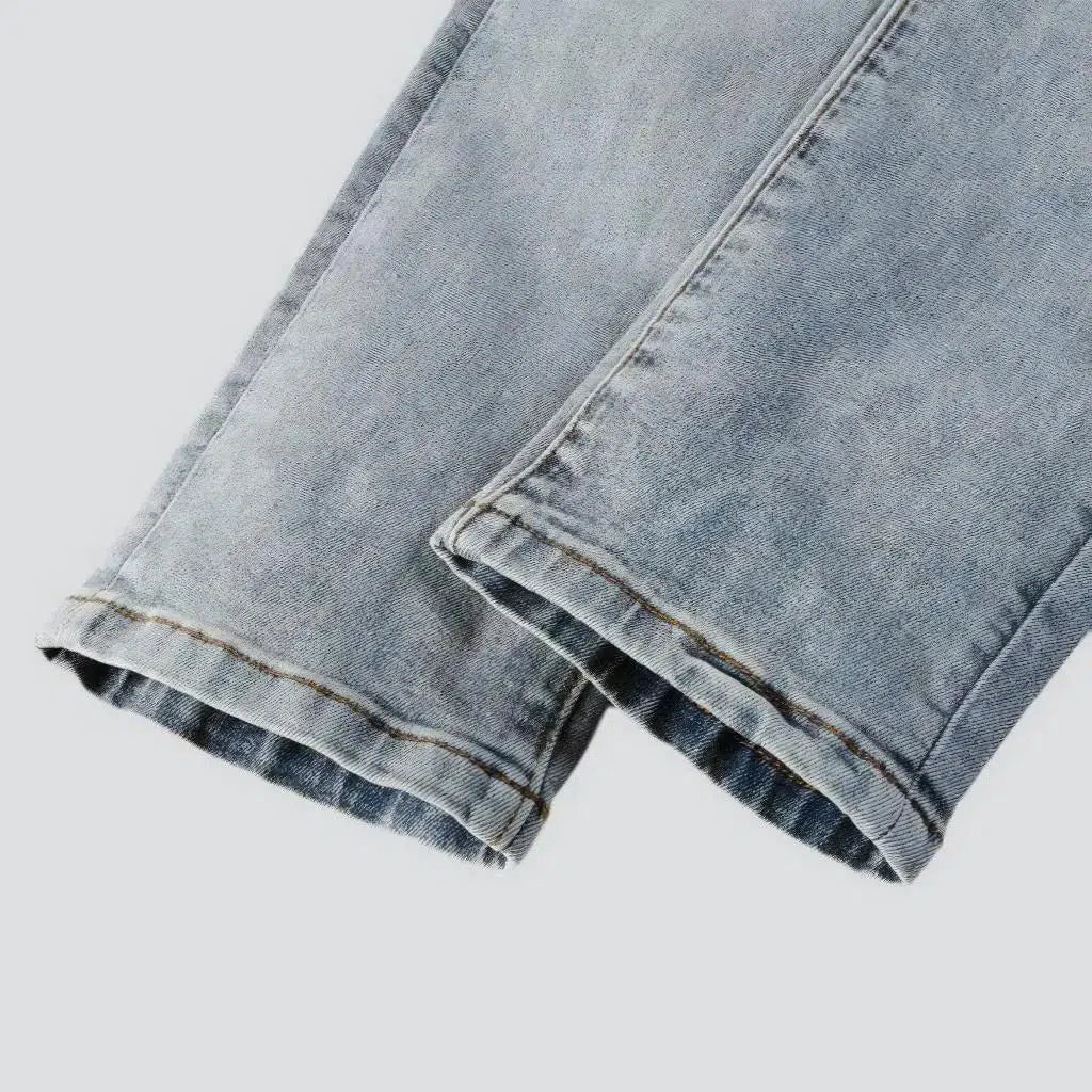 Black-patch whiskered jeans