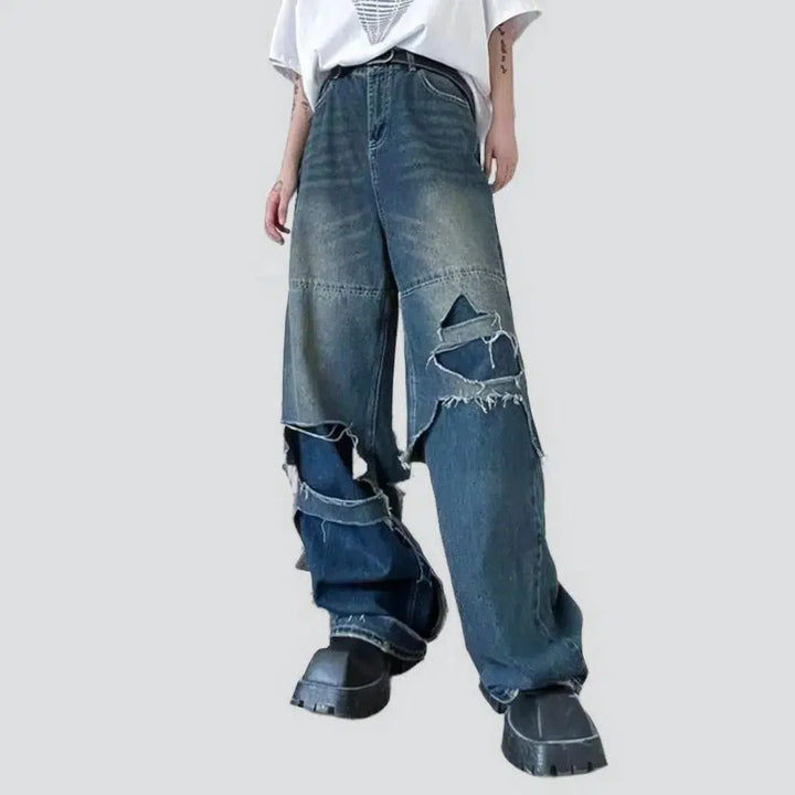 Layered men's whiskered jeans