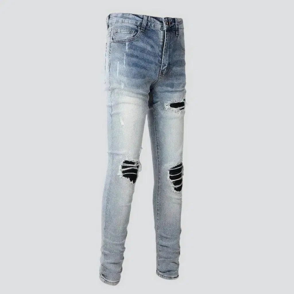 Black-patch whiskered jeans