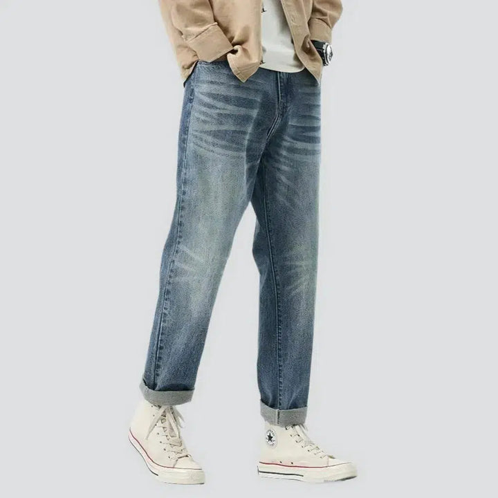 Medium-wash men's fashion jeans