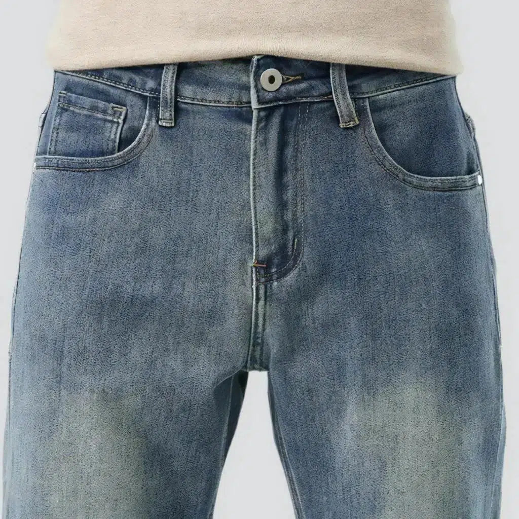High-waist men's light-wash jeans
