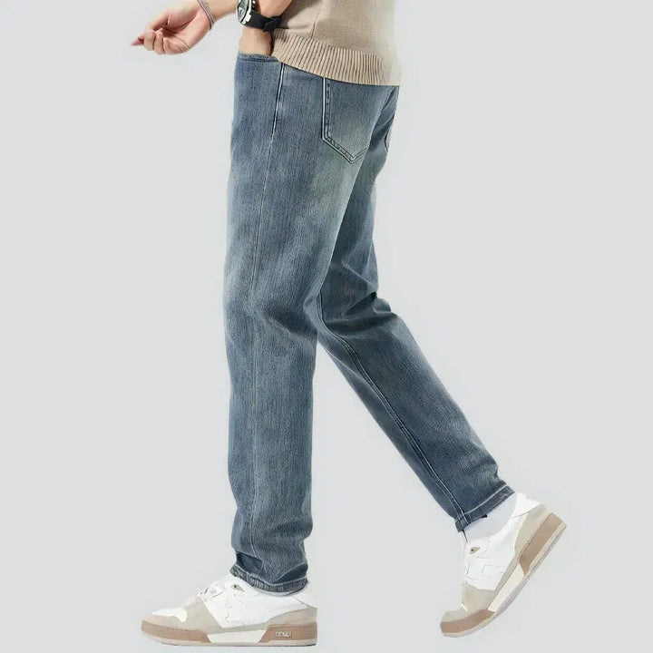 High-waist men's light-wash jeans