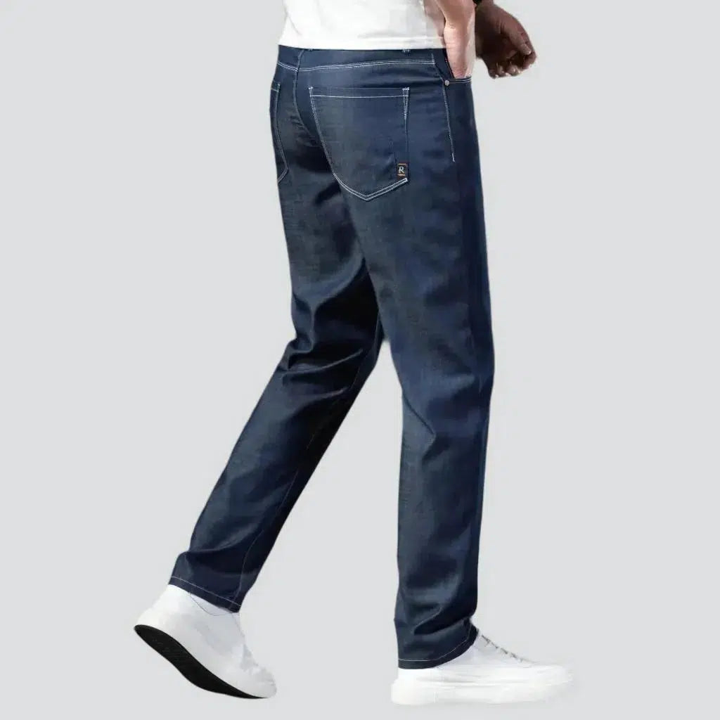 Dark men's tapered jeans