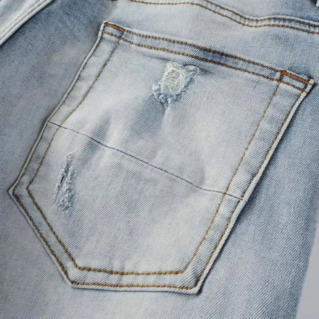 Light-wash distressed jeans