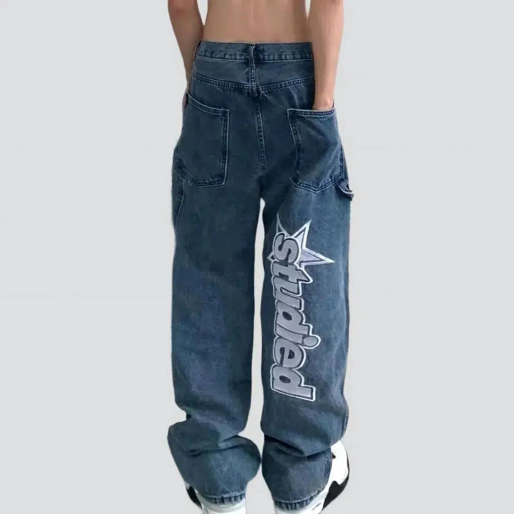 Inscribed men's painted jeans