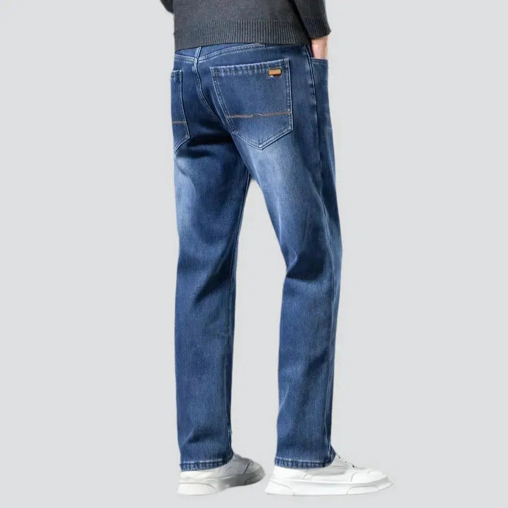 Insulated men's stonewashed jeans