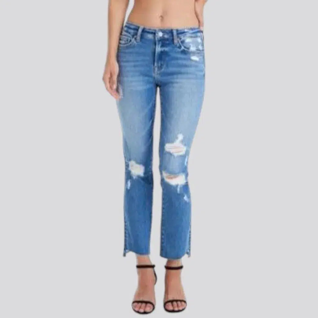 Distressed ankle-length jeans