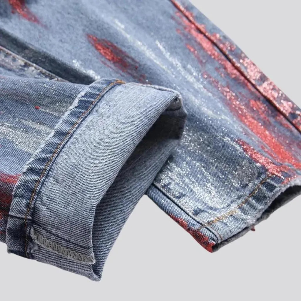 Distressed men's light-wash jeans