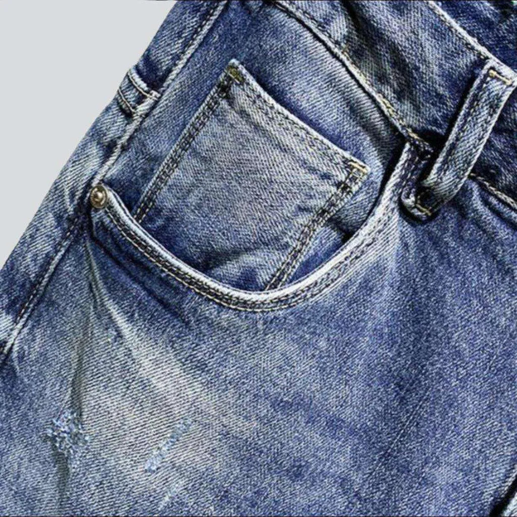 Ripped light blue men's jeans