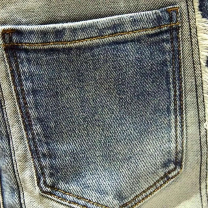 Mid-waist men's reworked jeans