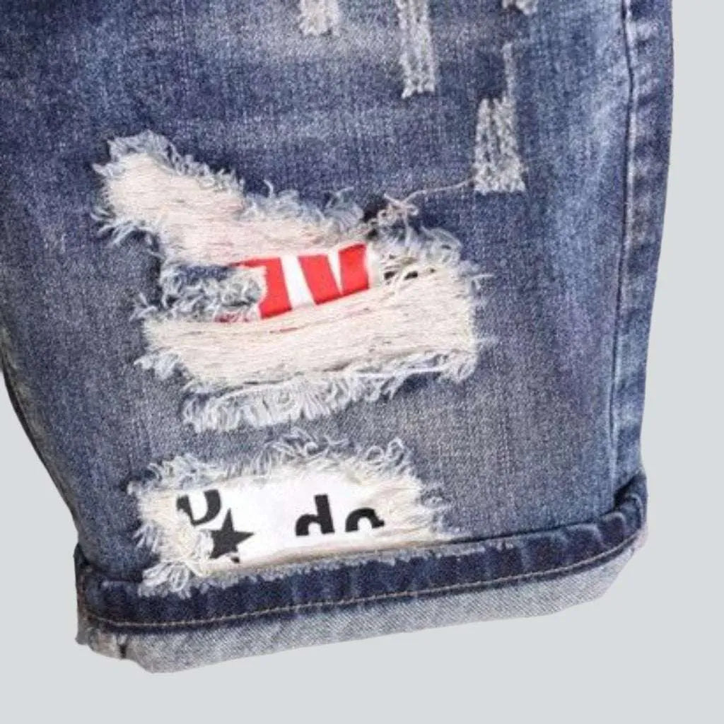 Inscribed patch distressed denim shorts