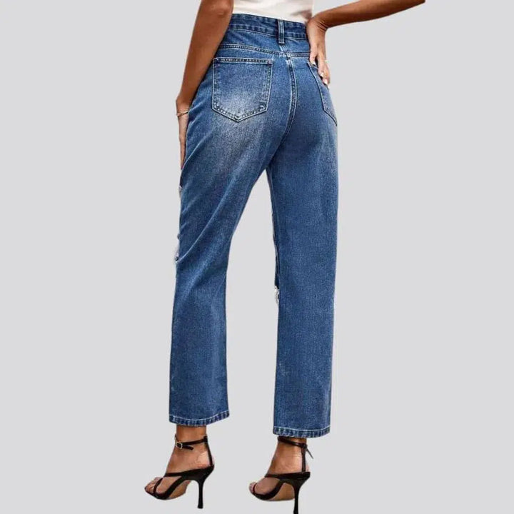 Grunge women's medium-wash jeans