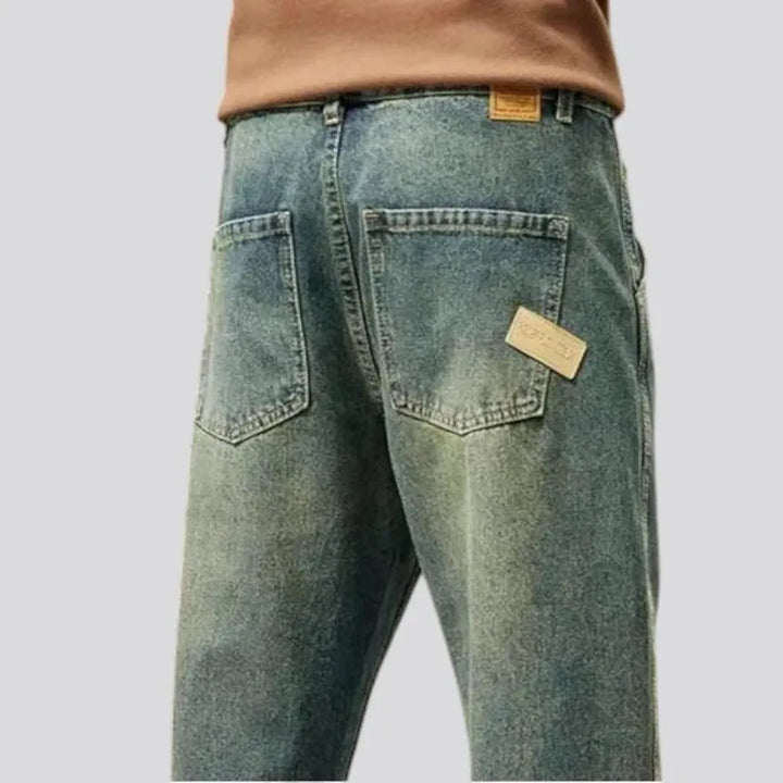 Vintage style roomy faded men's jeans