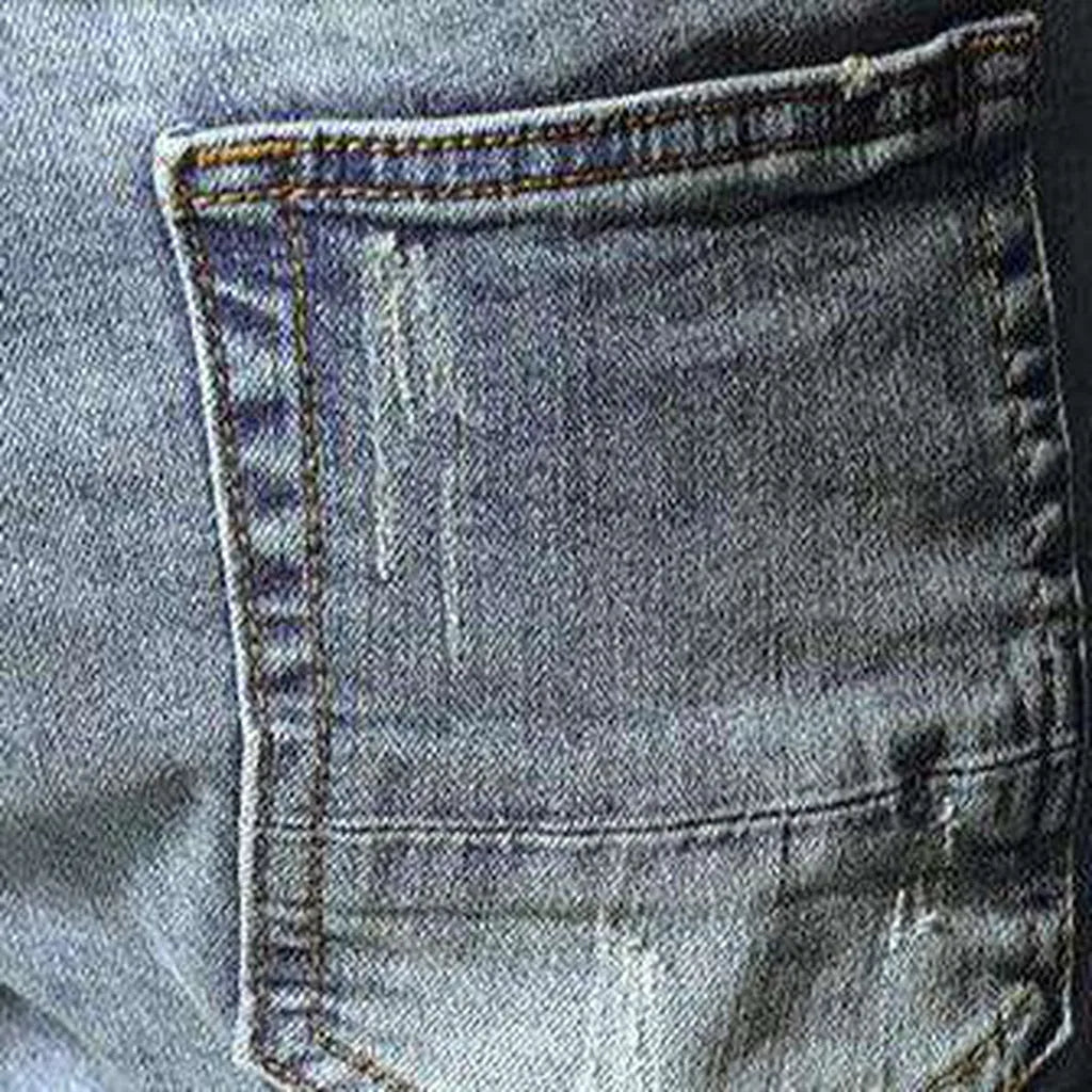 Patchwork knees men's moto jeans