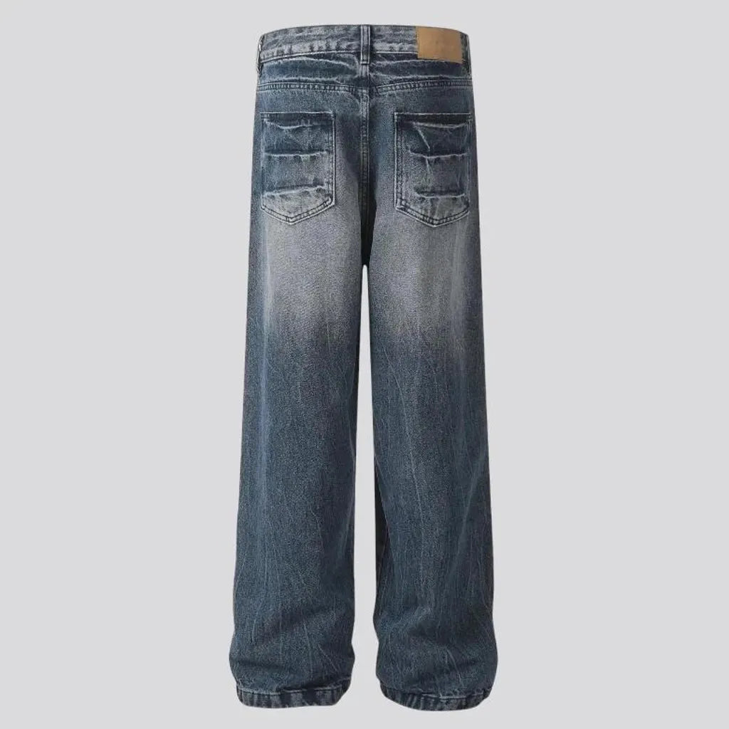 Boho style baggy-leg faded men's jeans