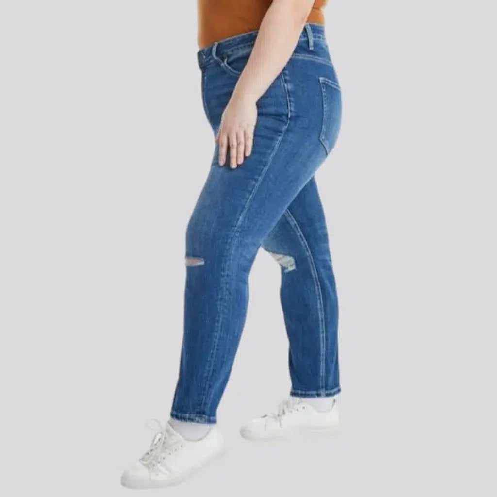 Dark-wash women's ripped jeans