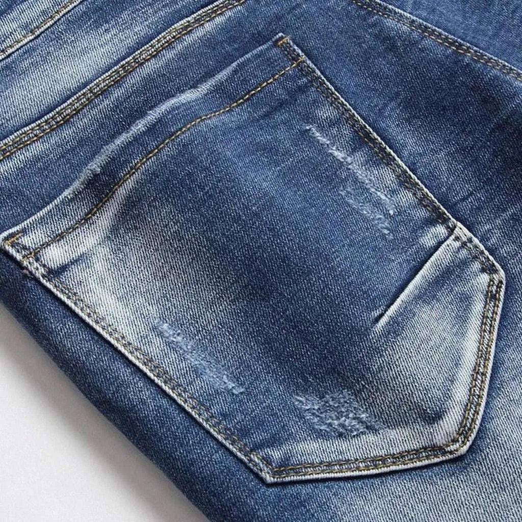 Medium wash ripped men's jeans