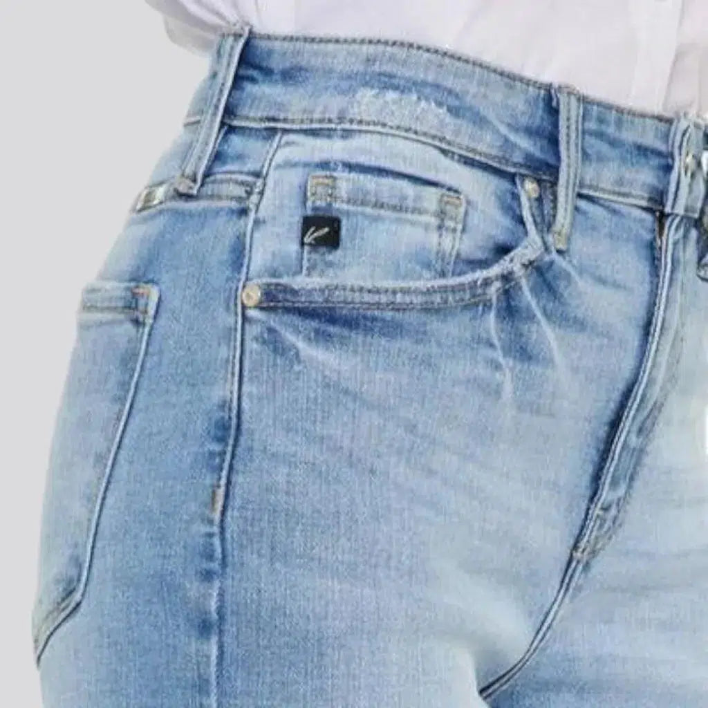 Sanded women's distressed-hem jeans