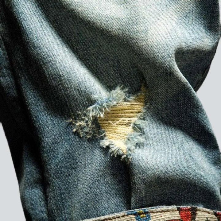 Ornament embroidery ripped denim shorts