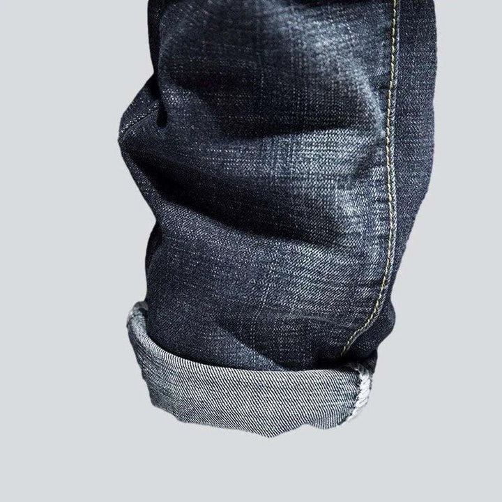 Dark wash men's ripped jeans