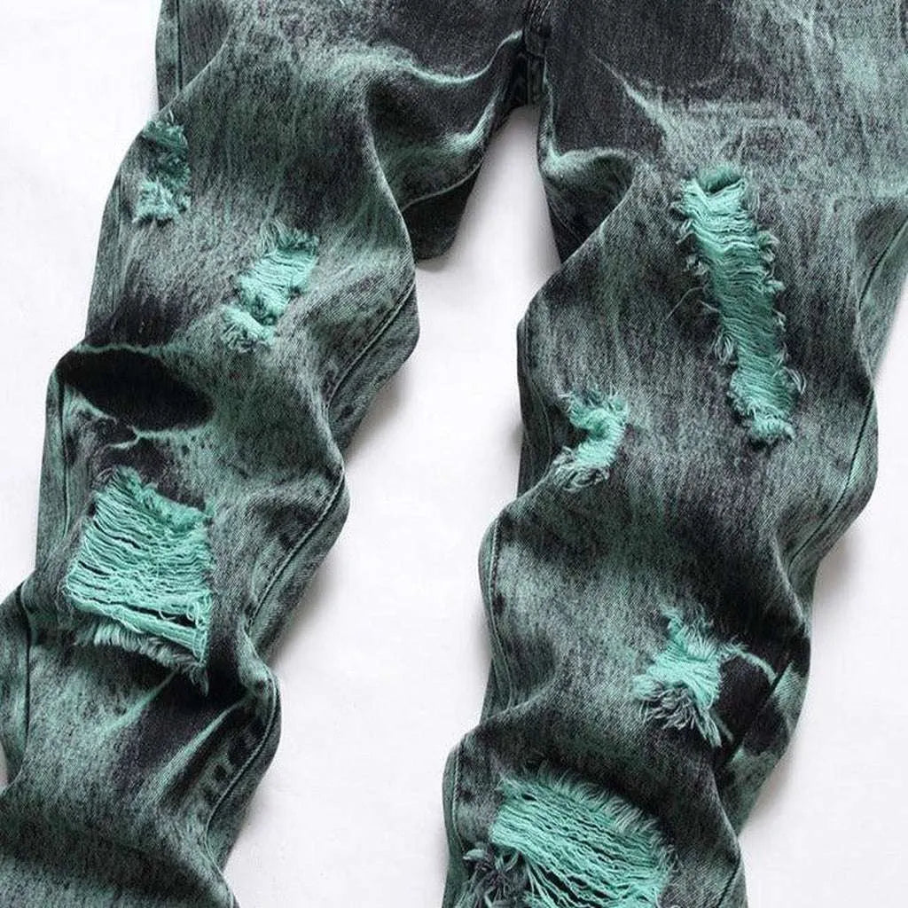 Distressed green men's jeans