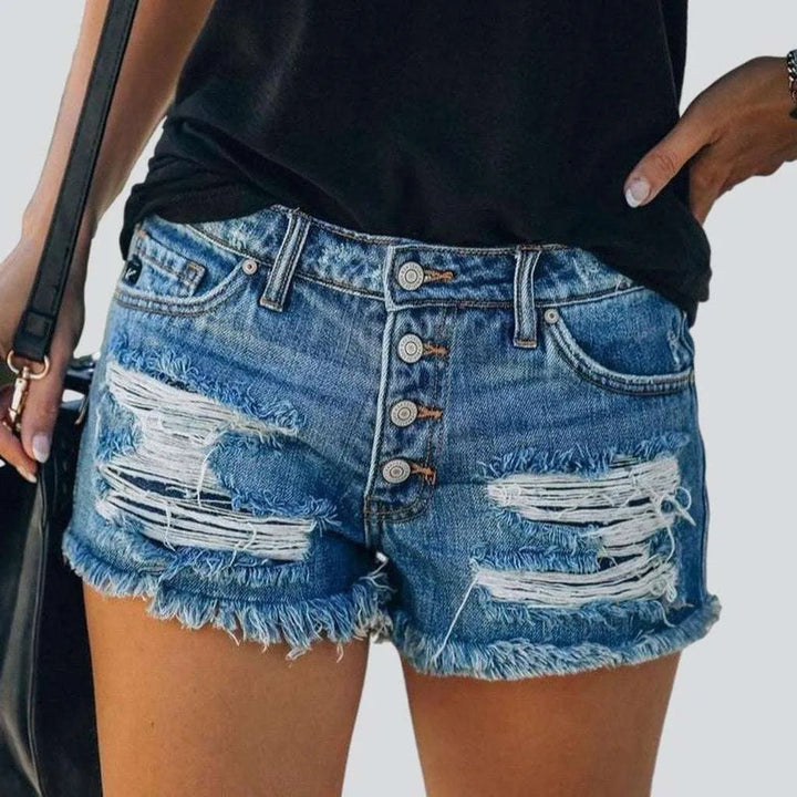 Ripped jeans shorts with buttons