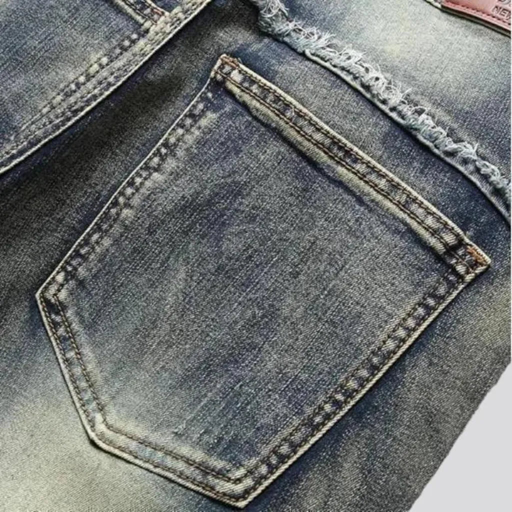 Raw-hem men's embellished jeans