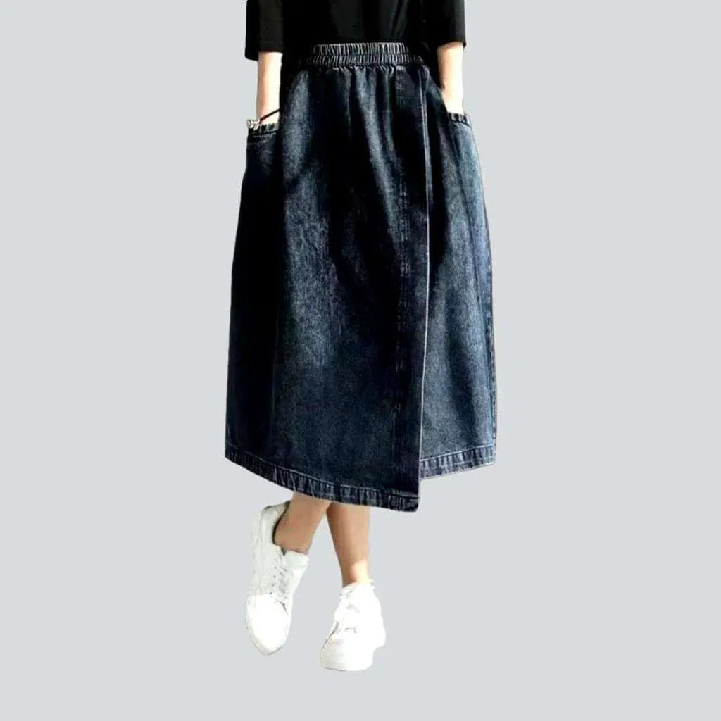 Asymmetric denim skirt with rubber