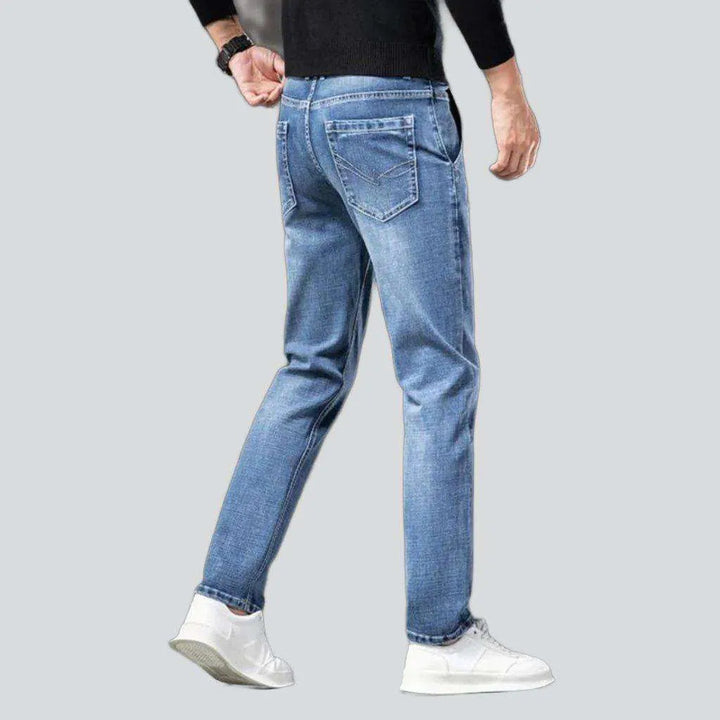 Diagonal pocket sanded men's jeans