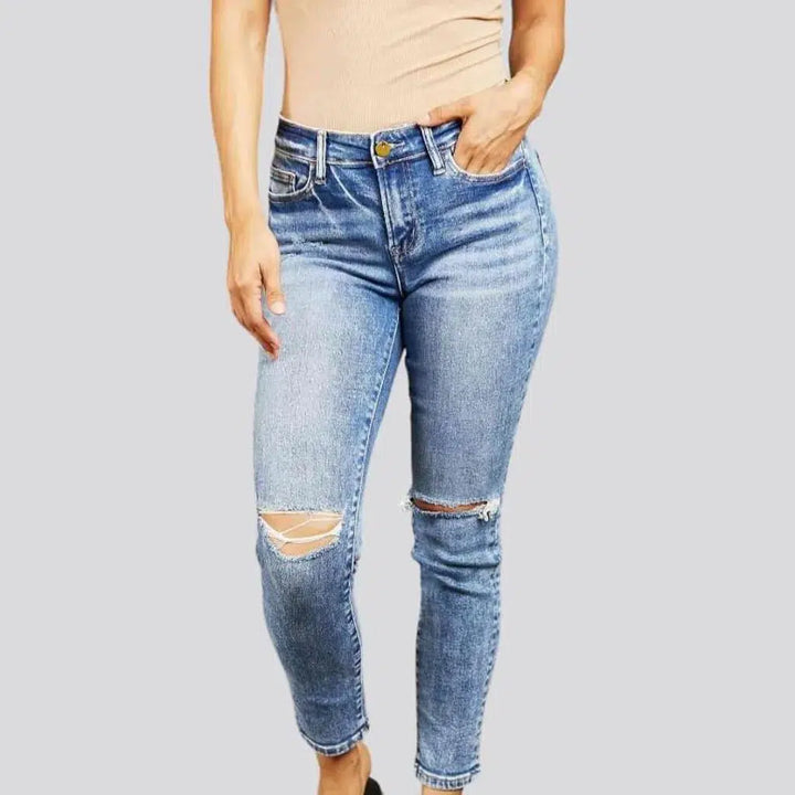 High-waist distressed jeans
 for ladies