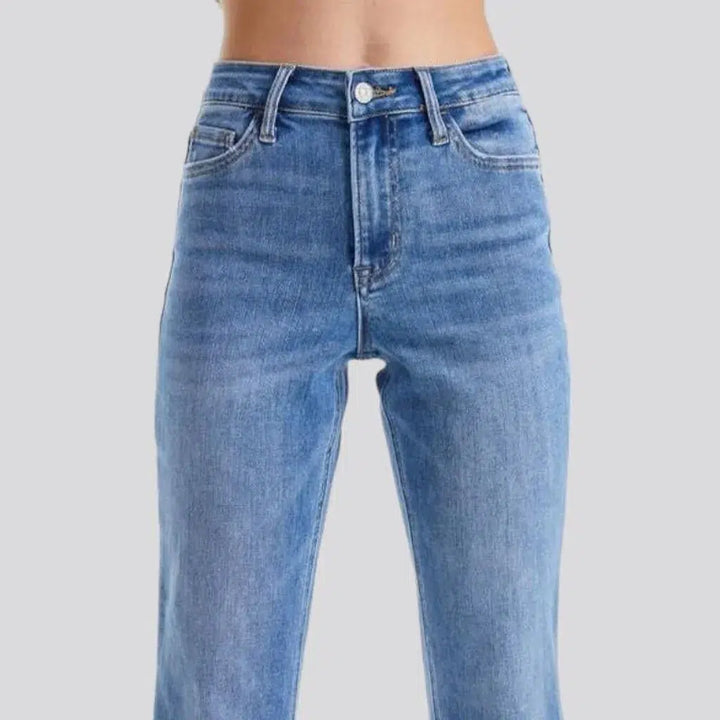 Sanded women's whiskered jeans
