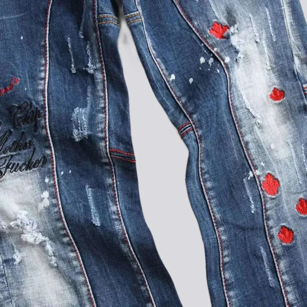 Mid-waist men's paint-splatter jeans