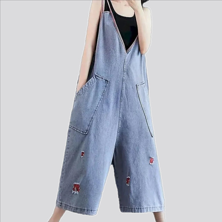 Stylish baggy-leg worn women's denim dungaree