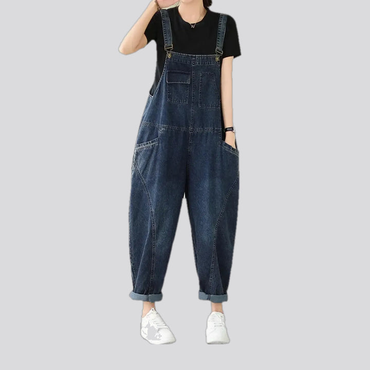 Slouchy dark 90s style women's denim dungaree