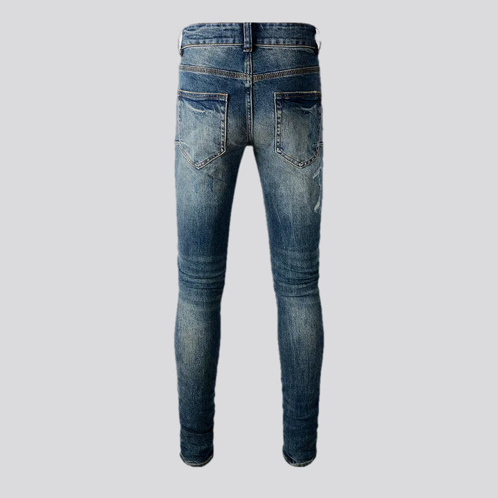 Distressed elastic men's jeans